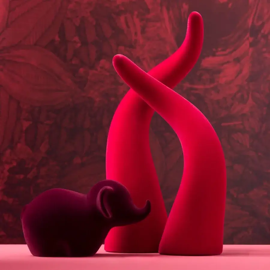 Exceptional Adriani e Rossi Horn Velvet Sculpture set crafted in ceramic with a ruby-colored velvet finish