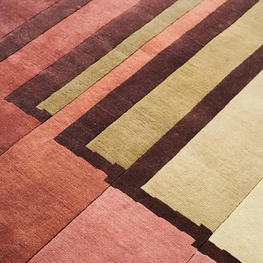 Lavish Amini RD Braque rug hand-knotted in New Zealand wool with terracotta and muted gold hues, finished through hand-washing and carving