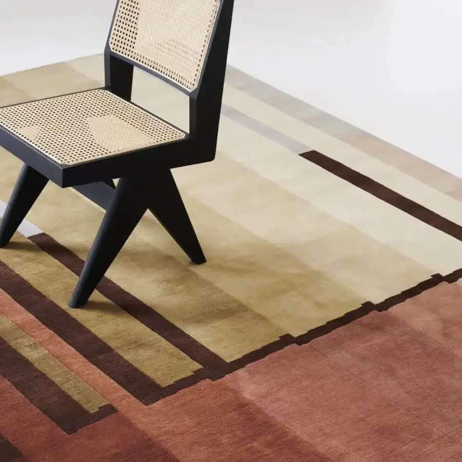 Distinguished Amini RD Braque rug hand-knotted in New Zealand wool with layered geometric design and earthy reddish-brown olive green hues