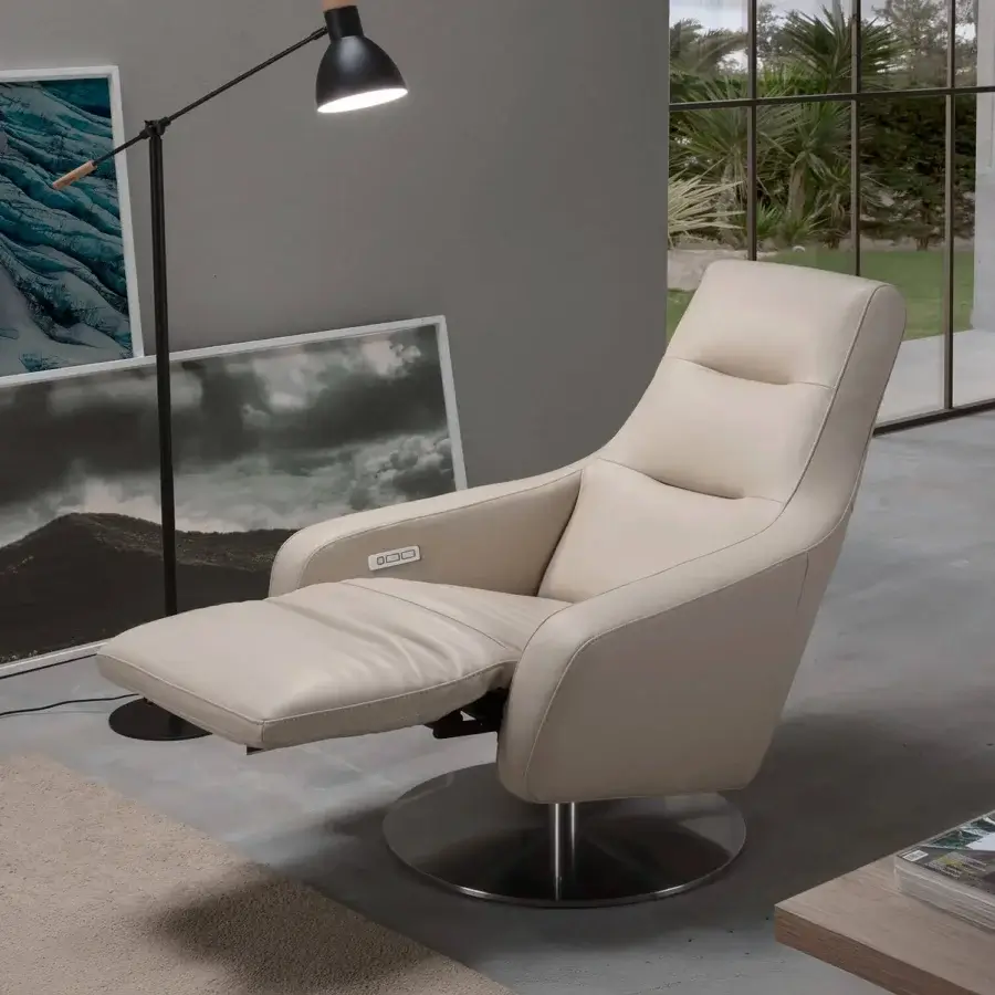 Lavish Egoitaliano Nora lounge chair built with pale beige polyurethane foam and shiny stainless steel base