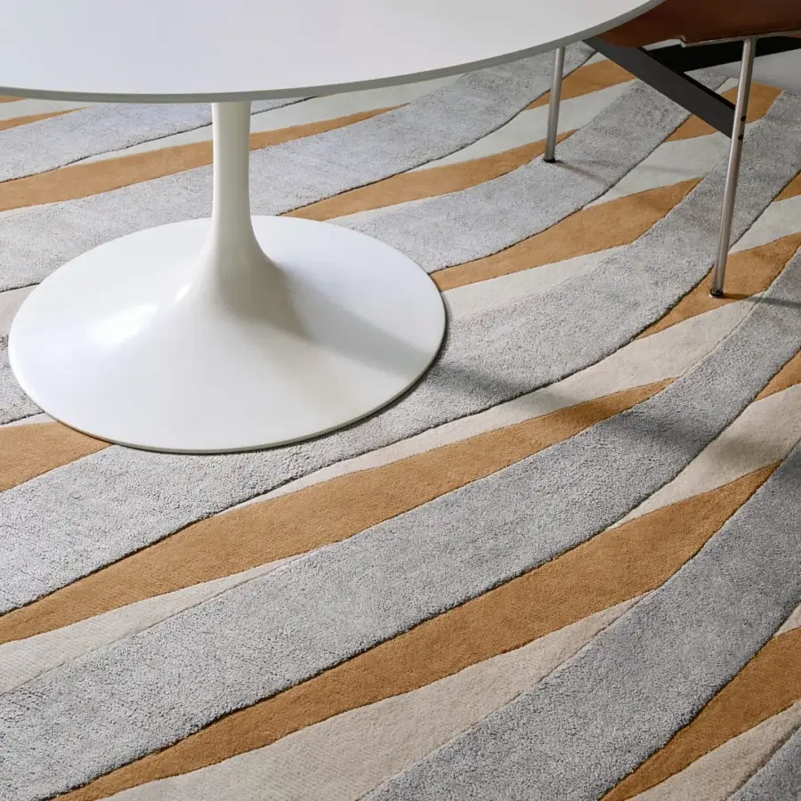 Distinguished Amini RD Twist rug with sinuous patterns in cream sand and basil green wool silk blend, hand washed and carved
