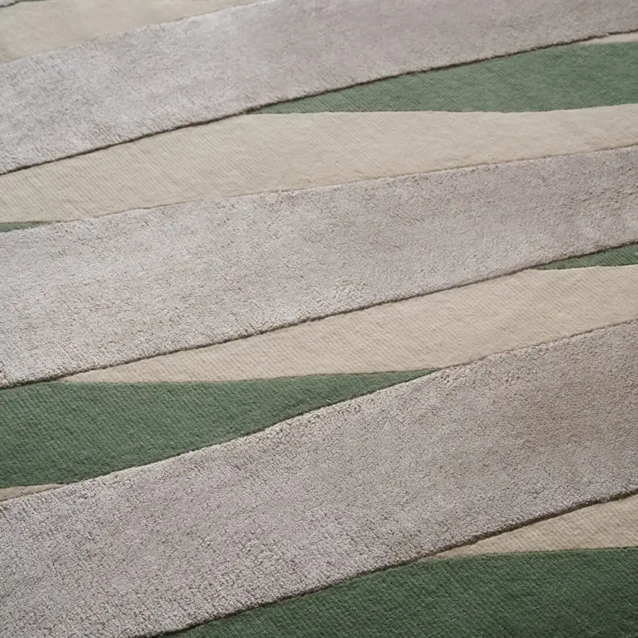 Exceptional Amini RD Twist rug hand-knotted with wool and silk in cream sand and basil green with a hand-washed finish