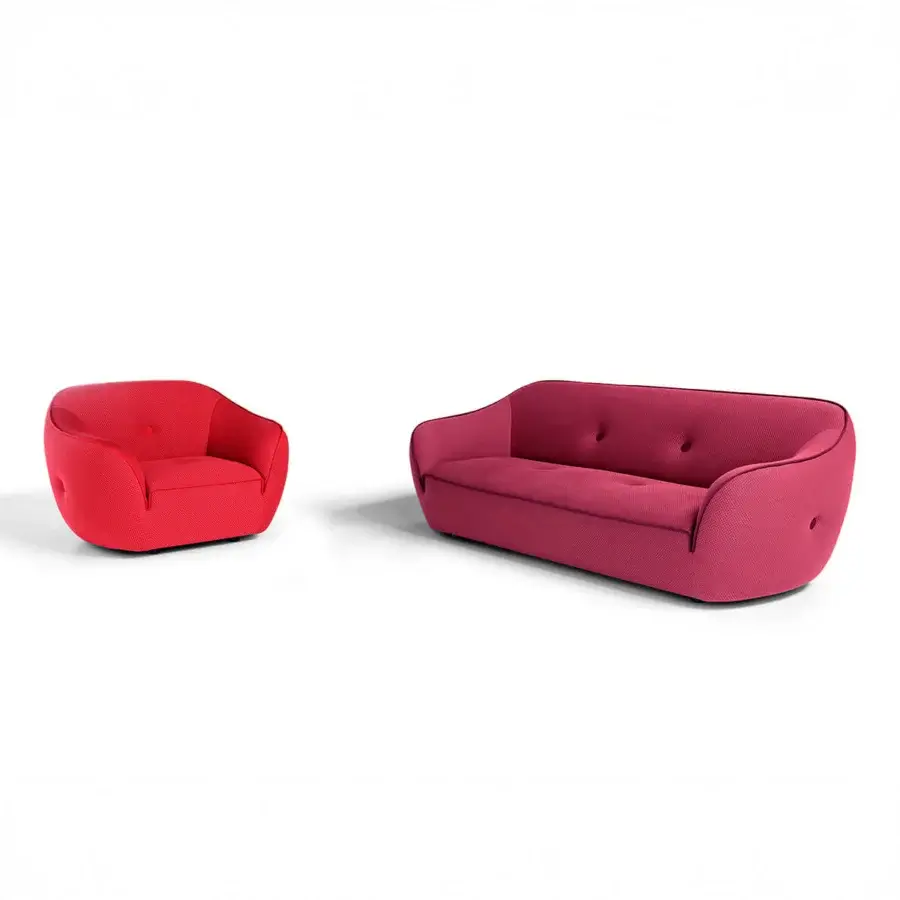 Distinguished Egoitaliano Bebop sofa with soft rounded form, reddish-pink bi-elastic technical fabric and button tufting