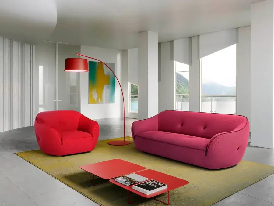 Lavish Egoitaliano Bebop sofa with rounded silhouette, pink bi-elastic technical fabric and matte textured upholstery