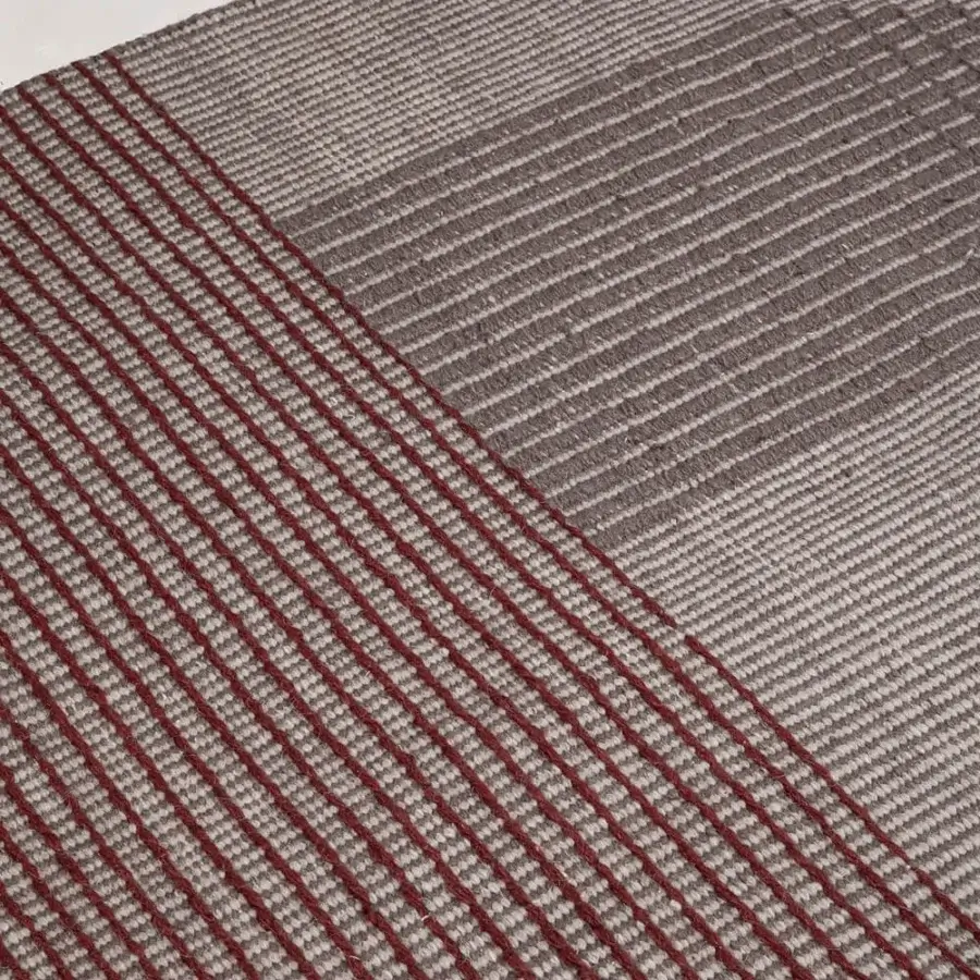 Exceptional Amini RD Trace rug with geometric reddish-brown lines against a muted gray, hand woven in New Zealand wool with carved texture