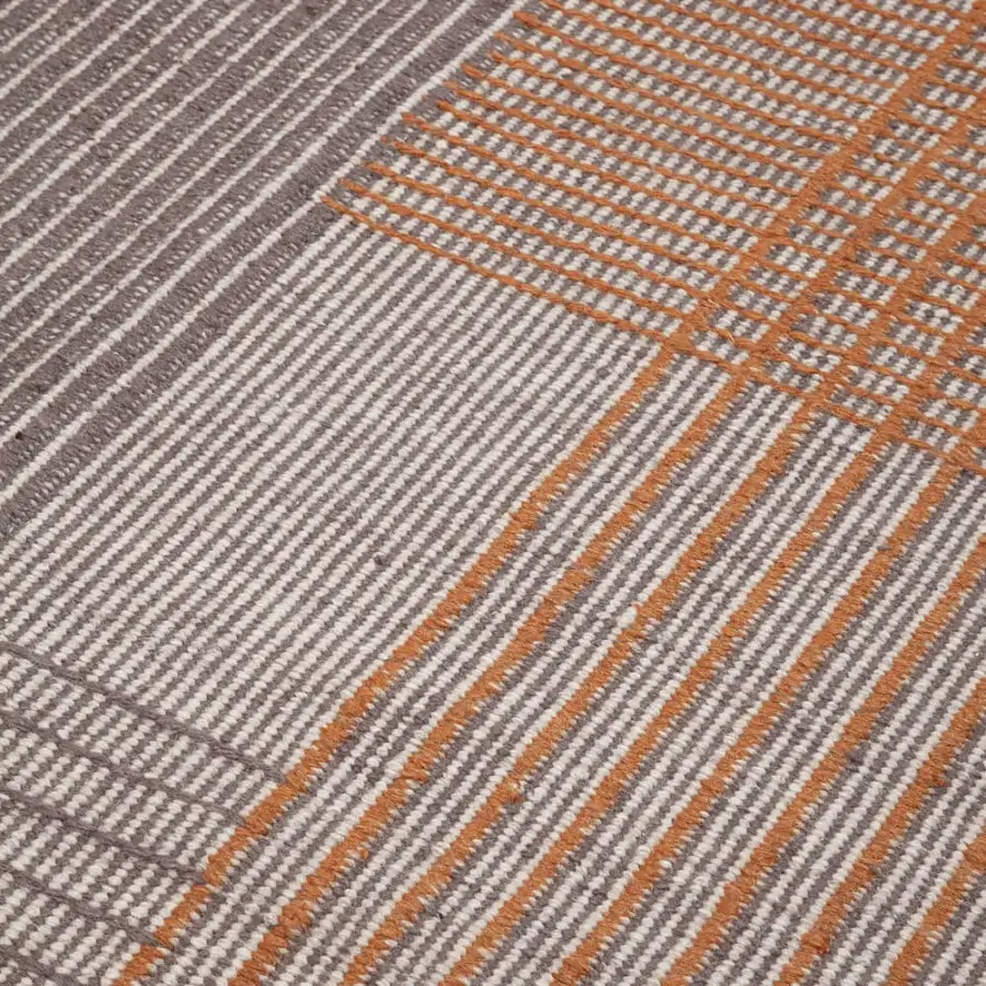 Distinguished Amini RD Trace rug with chromatic contrast in muted orange and gray handwoven New Zealand wool with clipped carving