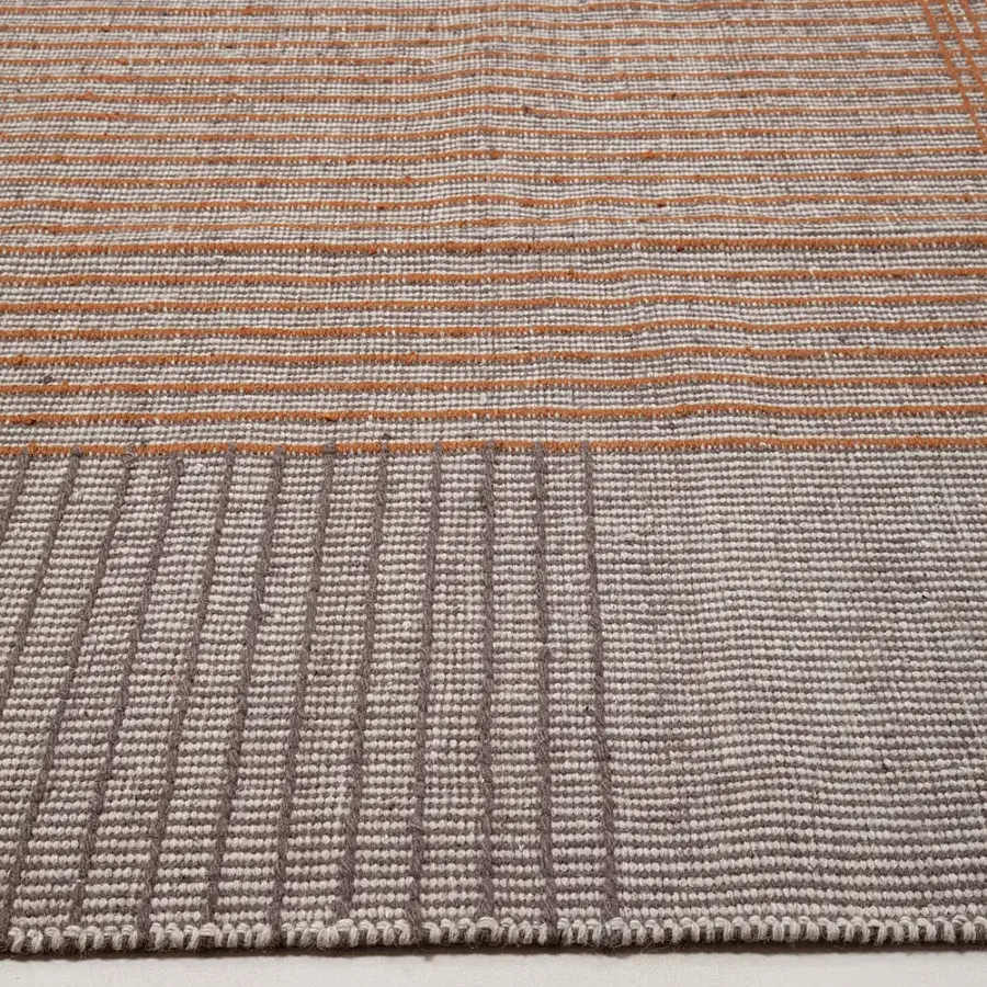Sophisticated Amini RD Trace rug hand-woven in New Zealand wool with geometric lines and a hand-washed carved finish