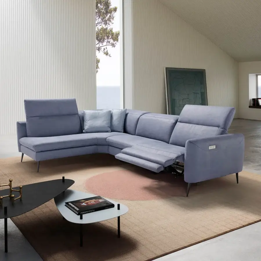Exceptional Egoitaliano Dusk sectional upholstered in muted grayish-blue textile with visible stitching and painted metal legs