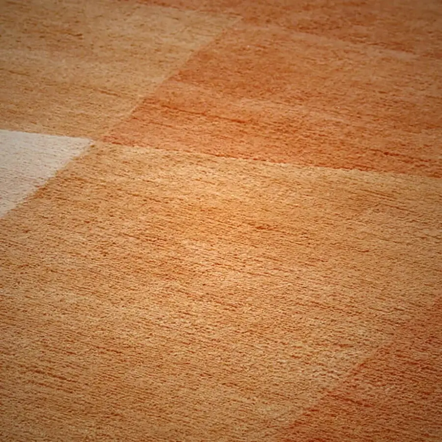 Distinguished Amini RD Shade rug hand-knotted in India with warm orange wool and cream silk geometric patterns, finished with meticulous carving
