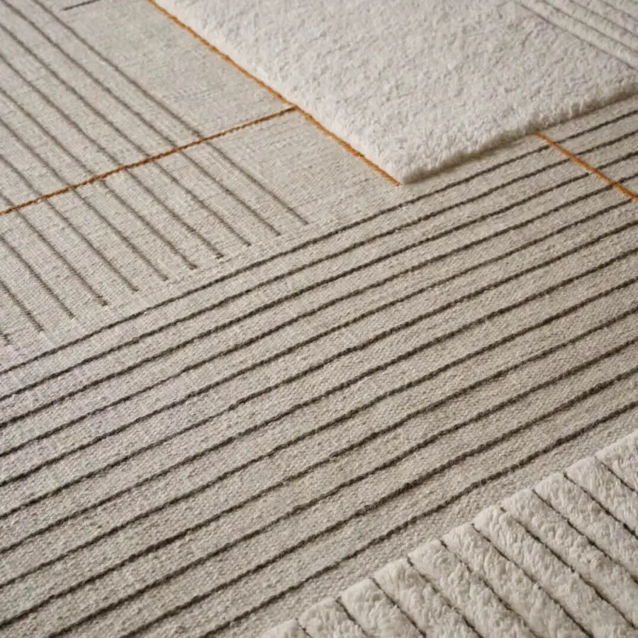 Exceptional Amini RD Halong rug with neutral beige and muted orange linear designs in hand-woven semi-worsted wool with a carved finish