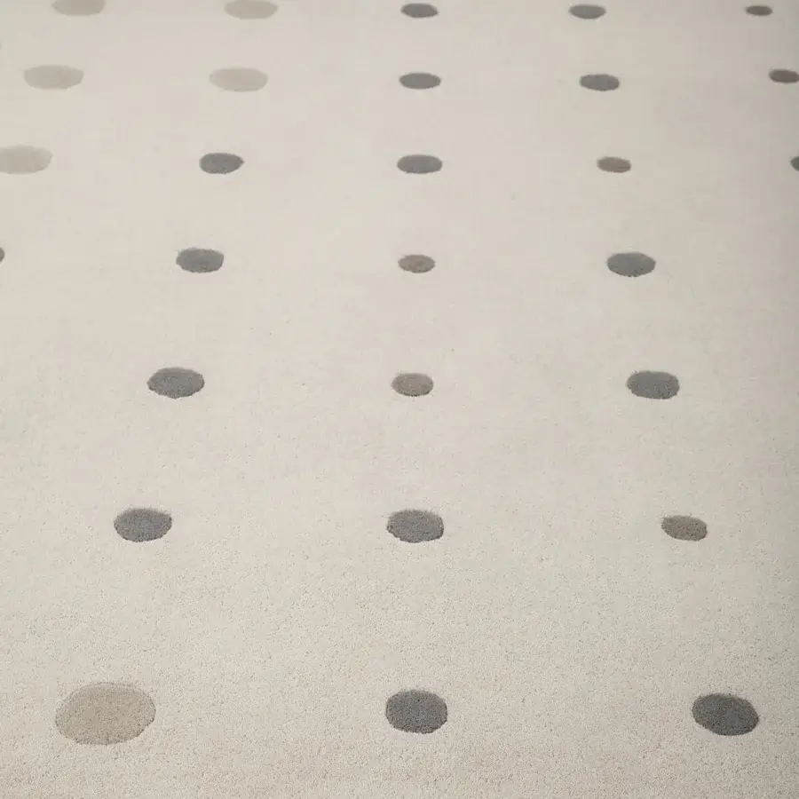 Exceptional Amini JC-1 Bubbles rug with circular motifs hand-tufted in New Zealand wool with a carved wool pile finish
