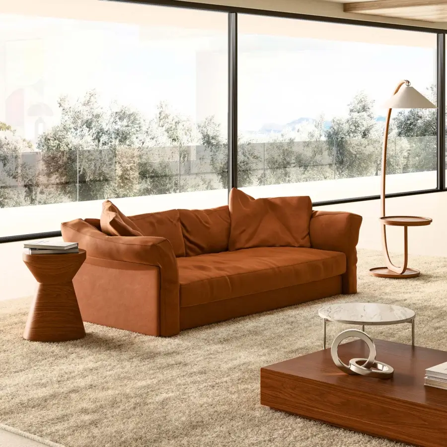Lavish Mascheroni Patrimonio sofa with a curved silhouette upholstered in reddish-brown textured leather-like textile and built with a solid wood frame