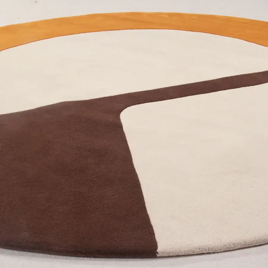 Avant-garde Amini JC-7 Isola rug with segmented design in orange, rust green, and green hand-tufted wool with carved surface