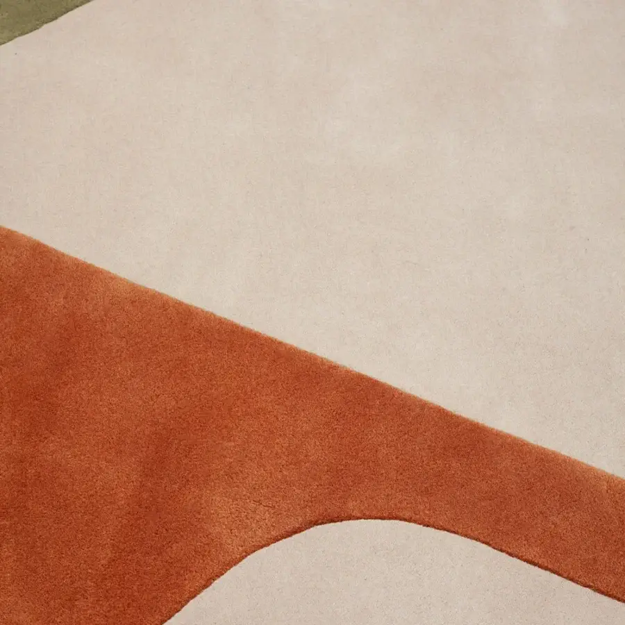 Distinguished Amini JC-7 Isola rug with color-blocked design in terracotta orange, rust green, and off-white New Zealand wool, hand-washed finish