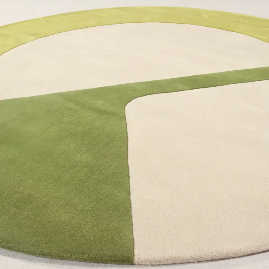 Distinguished Amini JC-7 Isola rug with geometric composition crafted in muted green and beige New Zealand wool with carved pile finish