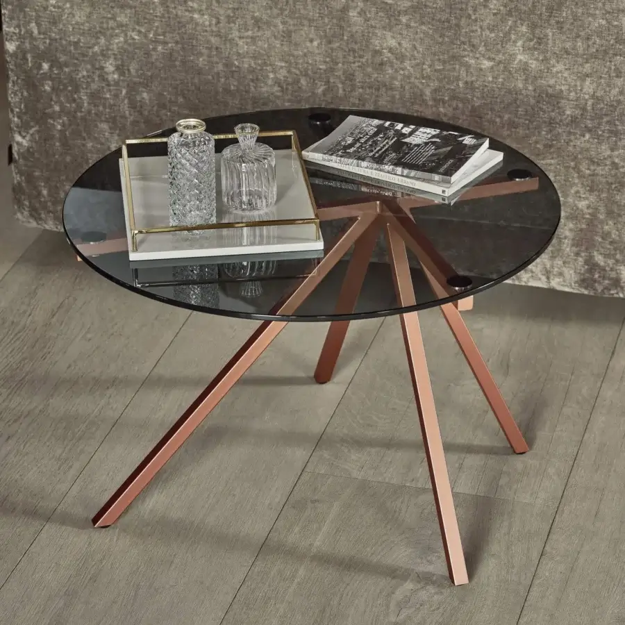Sophisticated Bontempi Ray coffee table with clear glass top and elegantly crossed rose-gold toned metal legs