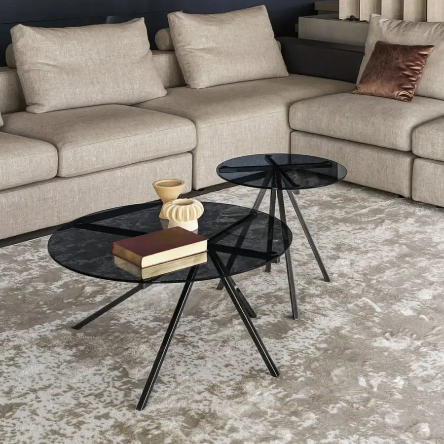 Elegant Bontempi Ray coffee table with a clear glass top and slender crossed legs in matte black finish