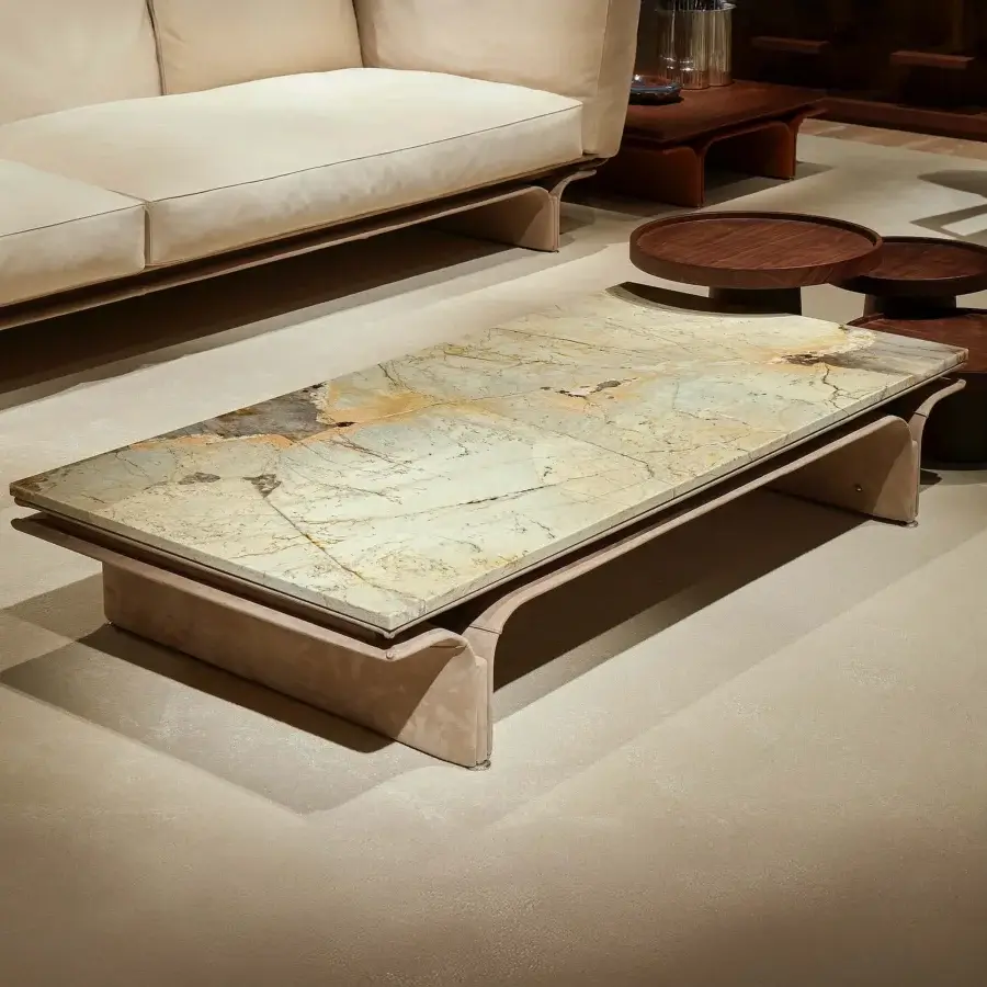 Distinguished Mascheroni Jazz John coffee table with Patagonia marble top and handmade leather-clad base in polished steel