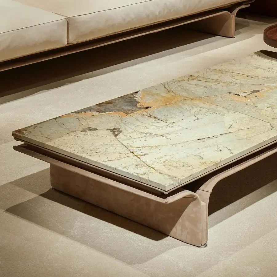 Exceptional Mascheroni Jazz John coffee table with Patagonia marble top and light-tan leather crafted base with polished steel feet