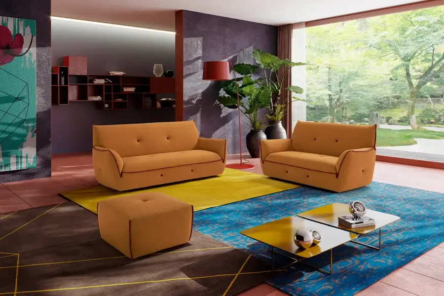 Distinguished Egoitaliano Yuki sofa with warm orange bi-elastic technical fabric and subtle button-tufted design crafted in Italy