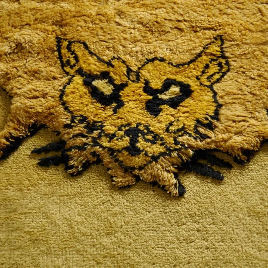 Distinguished Gabetti & Isola Tapileo rug hand-knotted in Italy with vibrant yellow wool and sculpted black accents