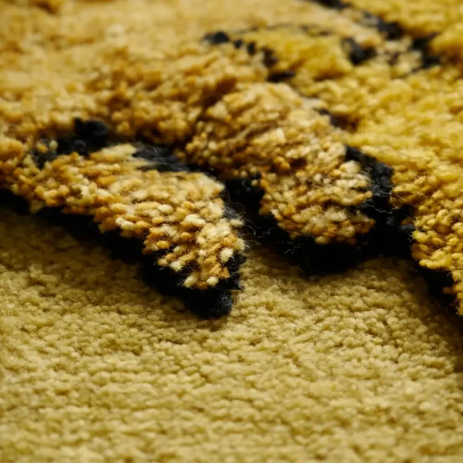 Lavish Amini Tapileo rug hand-knotted in pure wool with a tiger-inspired golden yellow and dark brown design and meticulous finish