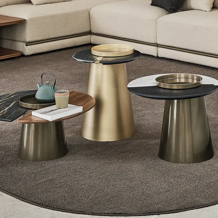 Distinguished Bontempi Yang coffee table built in satin metal with a dark veined marble tabletop and muted gold tones