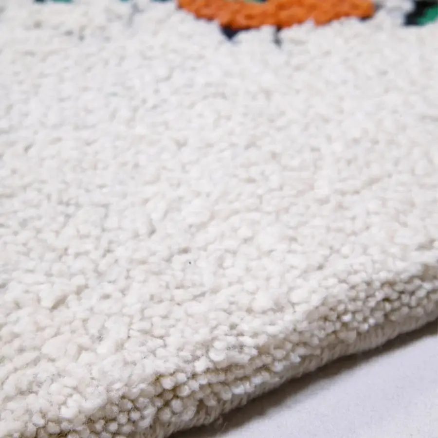 Exceptional Amini Tapidrago rug hand-knotted in pure wool with a playful green dragon motif and looped pile finish
