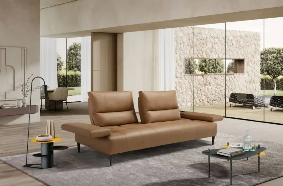 Distinguished Egoitaliano Tate sofa with warm medium-brown leather upholstery and sleek black ABS legs crafted in Italy