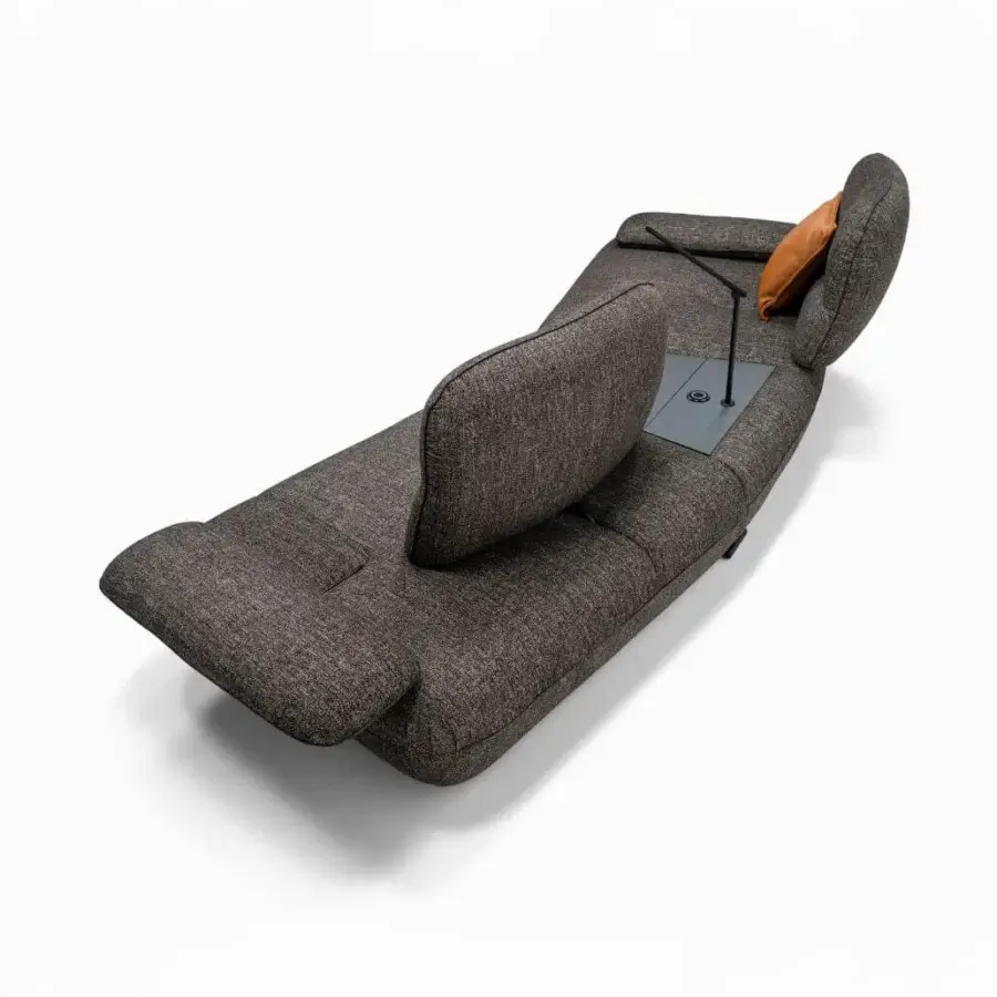 Innovative Egoitaliano Hoops modular sofa with medium-dark gray textured textile upholstery and warm brown accent cushion