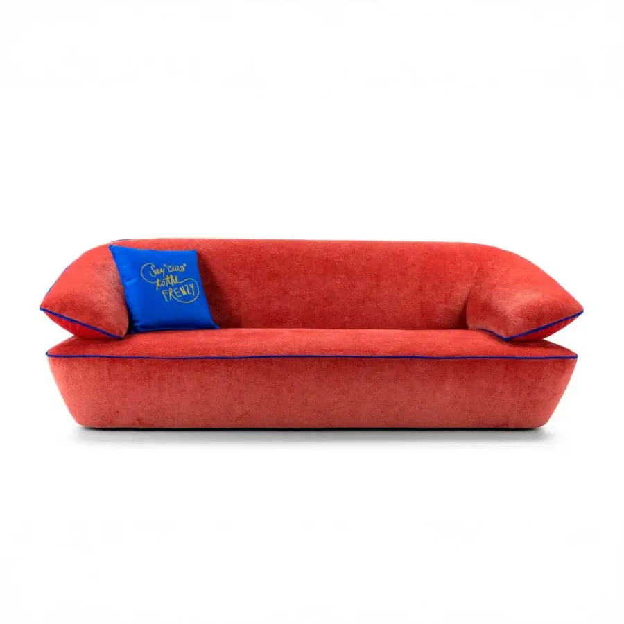 Distinguished Egoitaliano Momo sofa with reddish-orange velvet upholstery and Lycra piping accentuating a curved silhouette built with wood frame construction