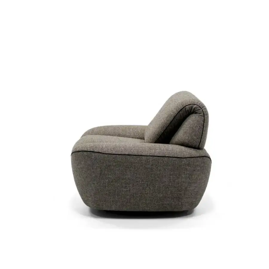 Superior Egoitaliano Smirk lounge chair with enveloping form upholstered in muted gray textile and matte finish