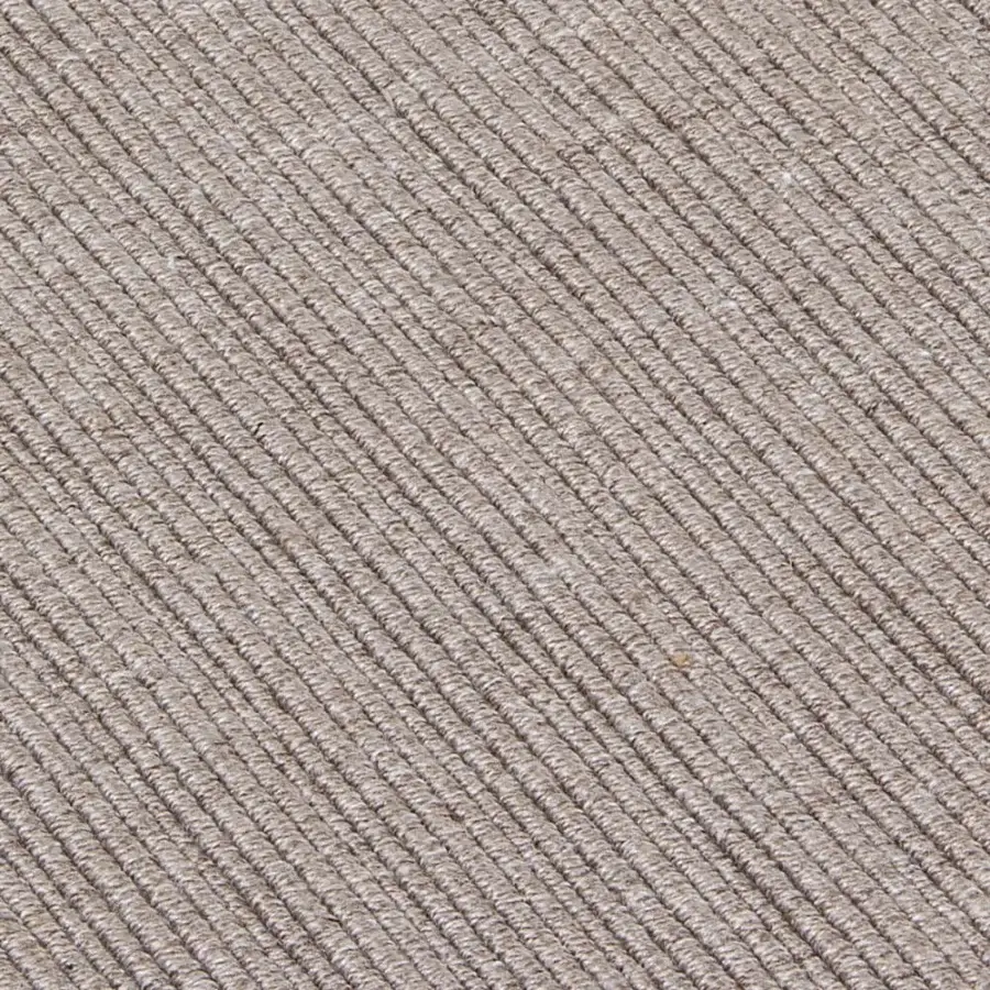Exceptional Amini Pierre rug hand-woven in India from recycled PET with a low pile and hand-clipped finish