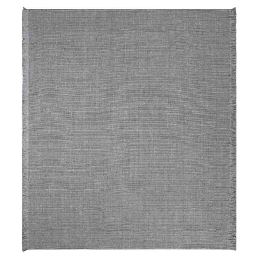 Distinguished Amini Pierre rug hand-woven in India from recycled PET with a heathered grey tone and delicate fringe detail