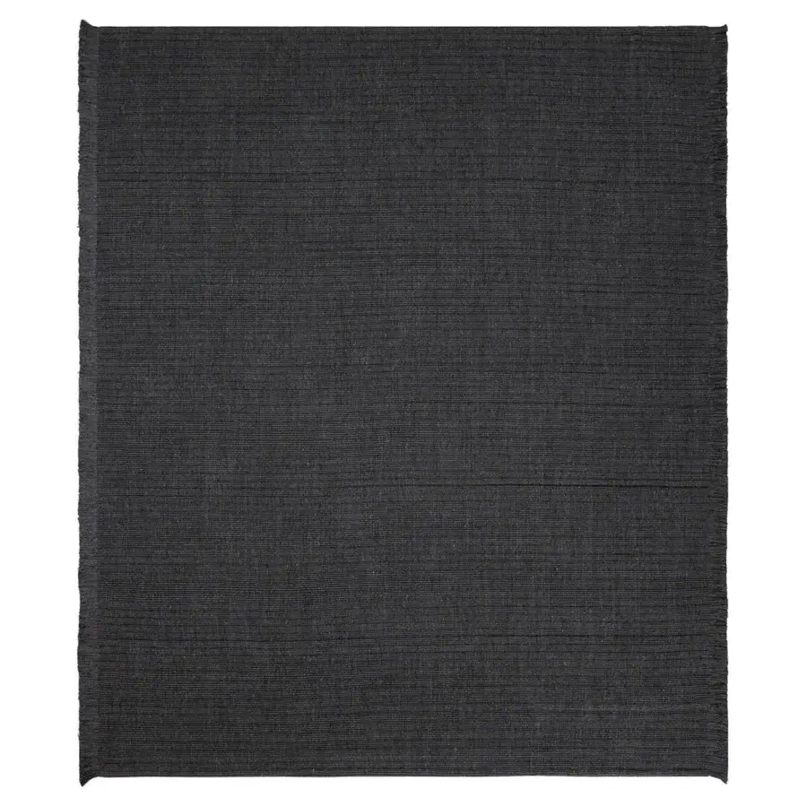 Refined Amini Pierre rug woven from recycled PET in dark charcoal gray with a hand-clipped finish for lasting quality