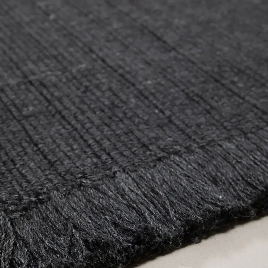 Refined Amini Pierre rug hand-woven in India from recycled PET with textural ribbing and a hand-clipped finish