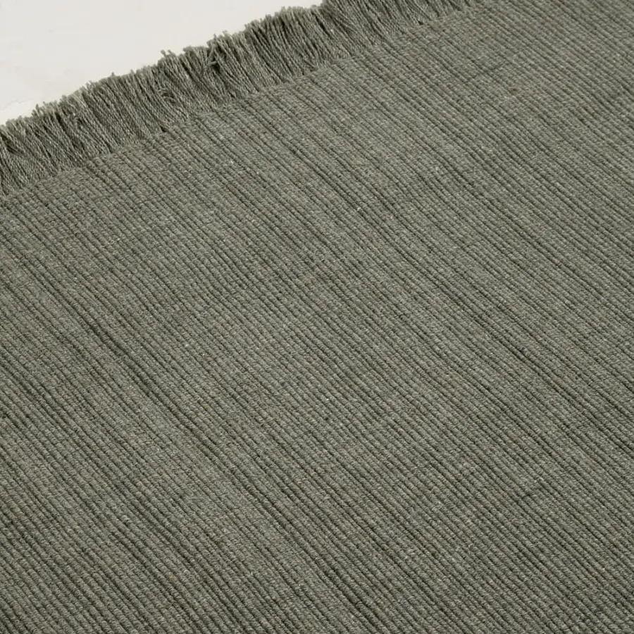 Distinguished Amini Pierre rug hand-woven in India from recycled PET with a hand-clipped finish and subtle tonal variations