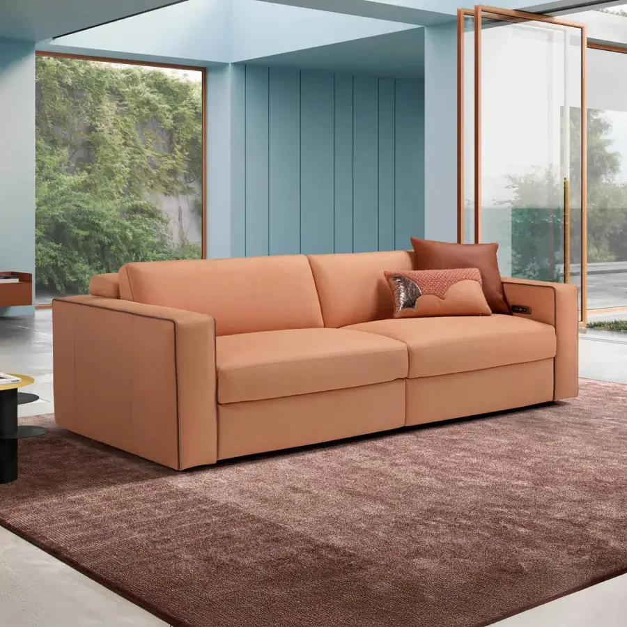 Exceptional Egoitaliano Kuby sofa with warm orange leather upholstery, adjustable mechanisms and refined piping details