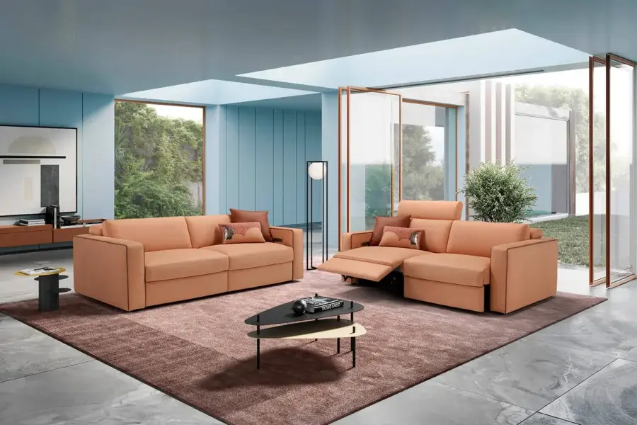Exceptional Egoitaliano Kuby sofa in muted coral woven fabric with electric recline and detailed rod stitching