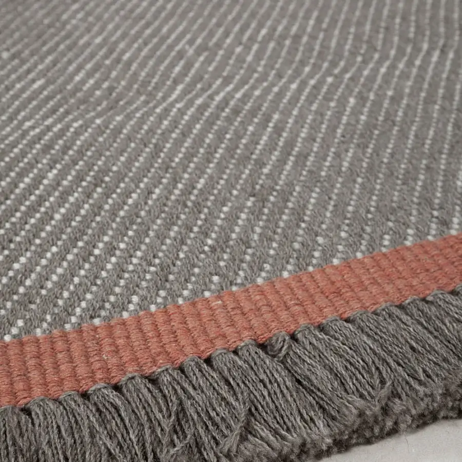 Exceptional Amini Sesame rug with contemporary stripes in composite grey and forest green recycled PET, finished with hand-clipped detailing