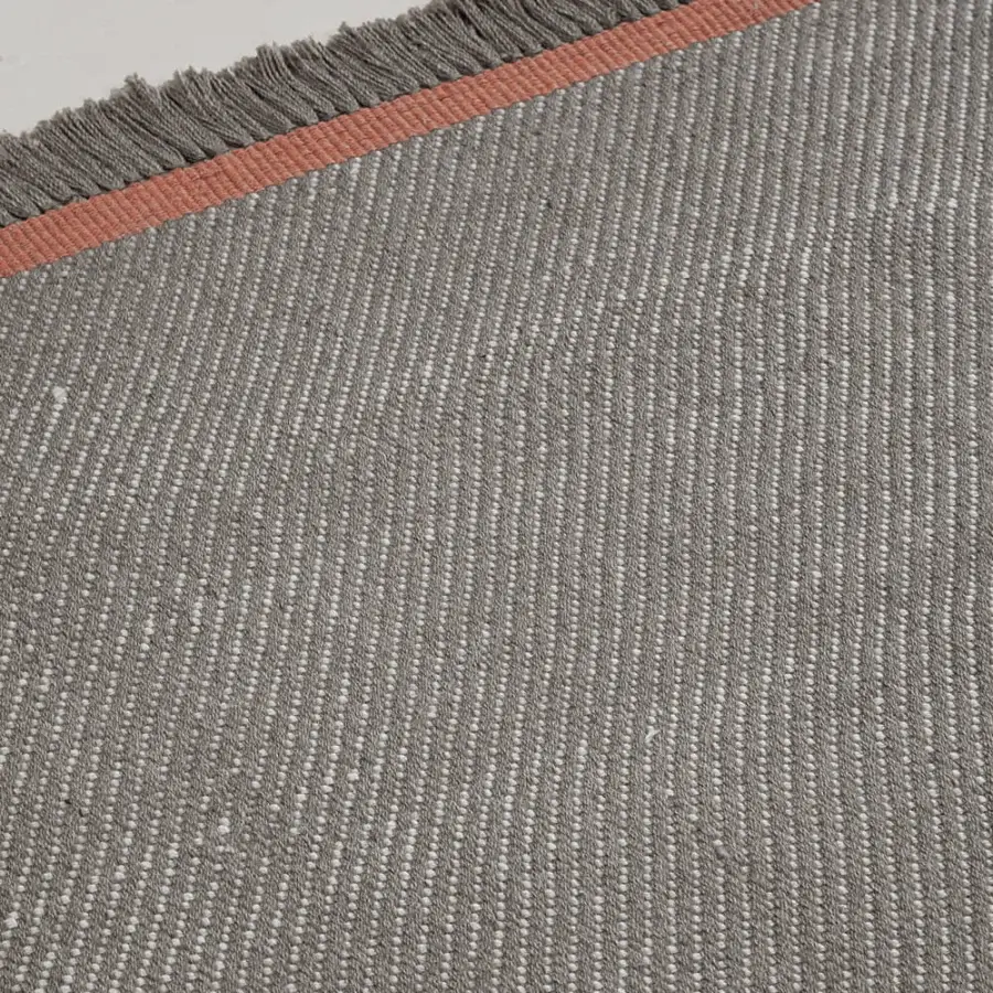 Superior Amini Sesame rug with heathered grey and terracotta accents hand-woven from recycled PET with clipped detailing