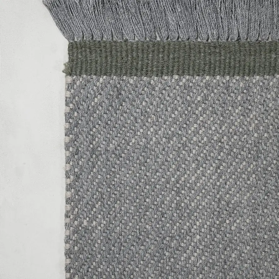 Exceptional Amini Sesame rug hand-woven in recycled PET with taupe and coral hues, finished with a hand-clipped edge