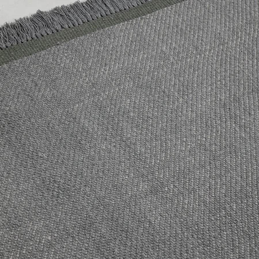 Distinguished Amini Sesame rug crafted in heathered taupe and coral recycled PET with hand clipping