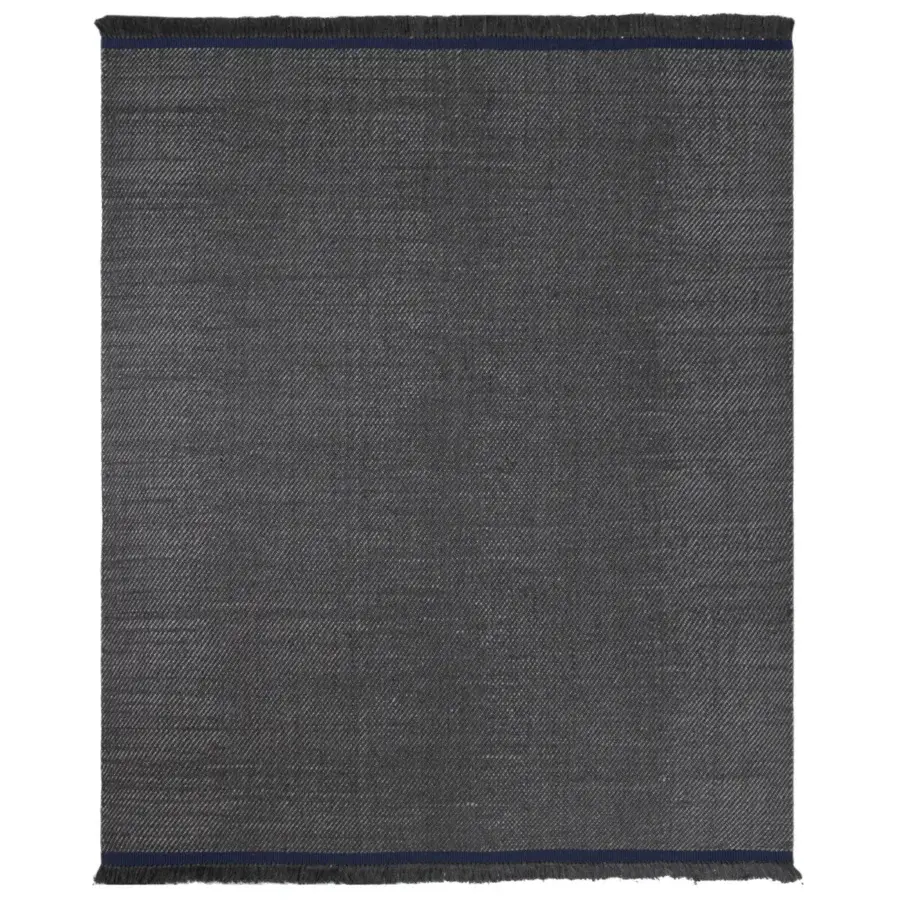 Exceptional Amini Sesame rug hand-woven in heathered charcoal and deep blue recycled PET with hand-clipped edges