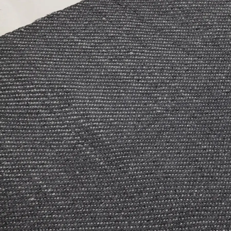 Exceptional Amini Sesame rug hand-woven in heathered dark gray recycled PET with a hand-clipped finish