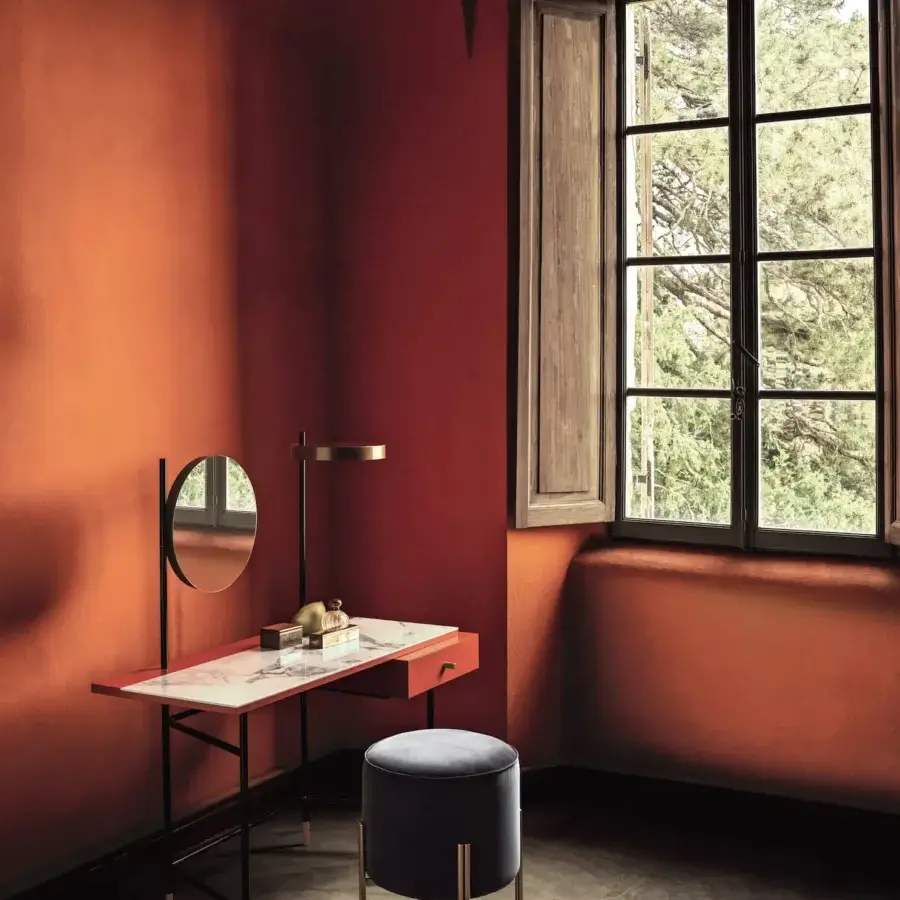 Distinctive Bontempi Vanity Desk with light marble-like synthetic tabletop and saturated red painted drawer front built with a dark metal frame
