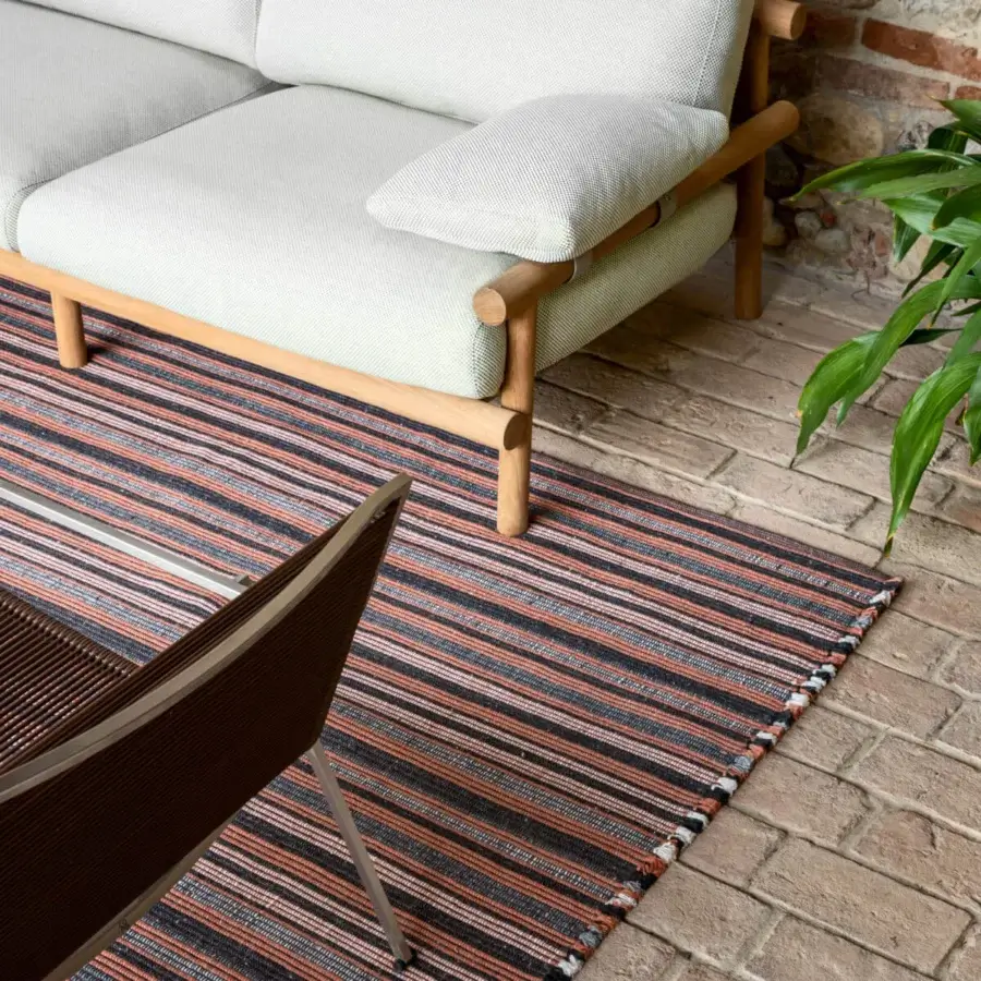 Distinguished Amini Prune rug hand-woven with prune, charcoal, and gray-beige recycled PET displaying striped patterns and hand-clipped detailing