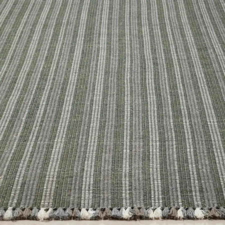 Exceptional Amini Prune rug hand-woven from recycled PET with subtle stripes in muted charcoal and coral tones, finished with hand-clipped detailing