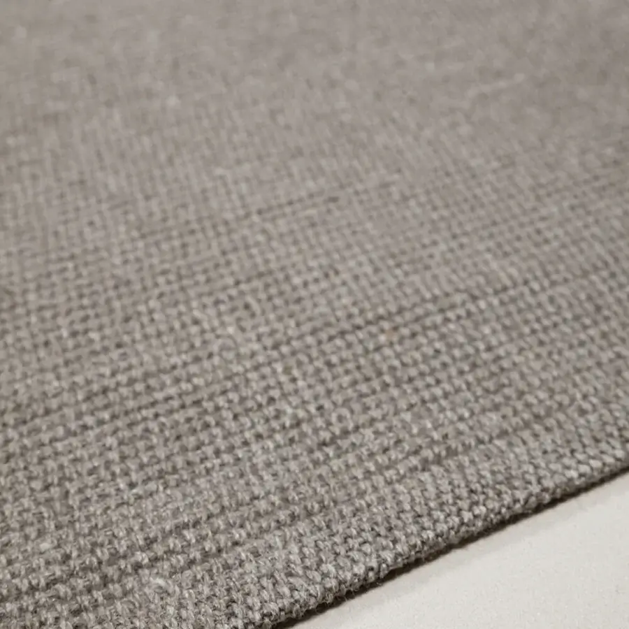 Elegant Amini Coco rug crafted from recycled PET with hand clipping, displaying a neutral beige-grey tone and subtle tonal variations