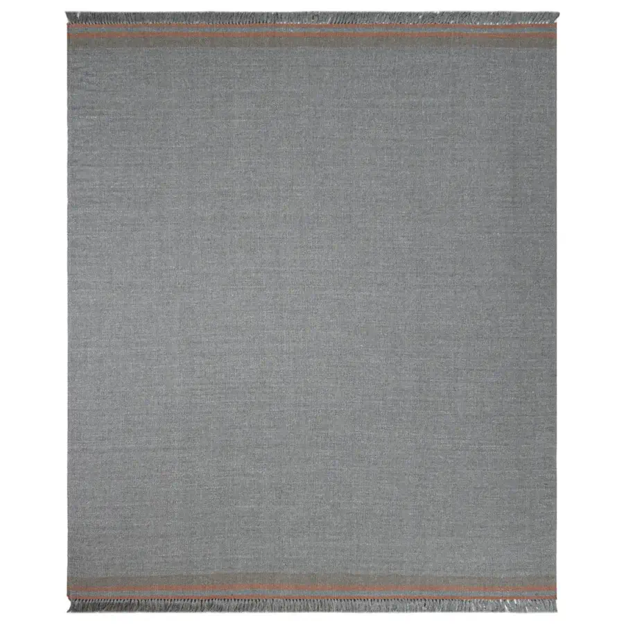 Elegant Amini Coco rug hand woven in India from recycled PET with a gradient of orange and beige and a hand-clipped finish